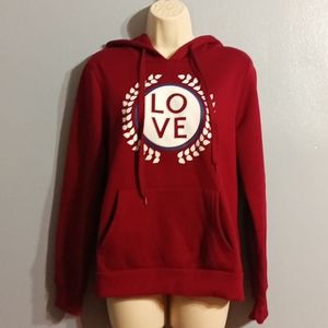 Dress in girl's large burgundy, white and blue kangaroo pouch hoodie
